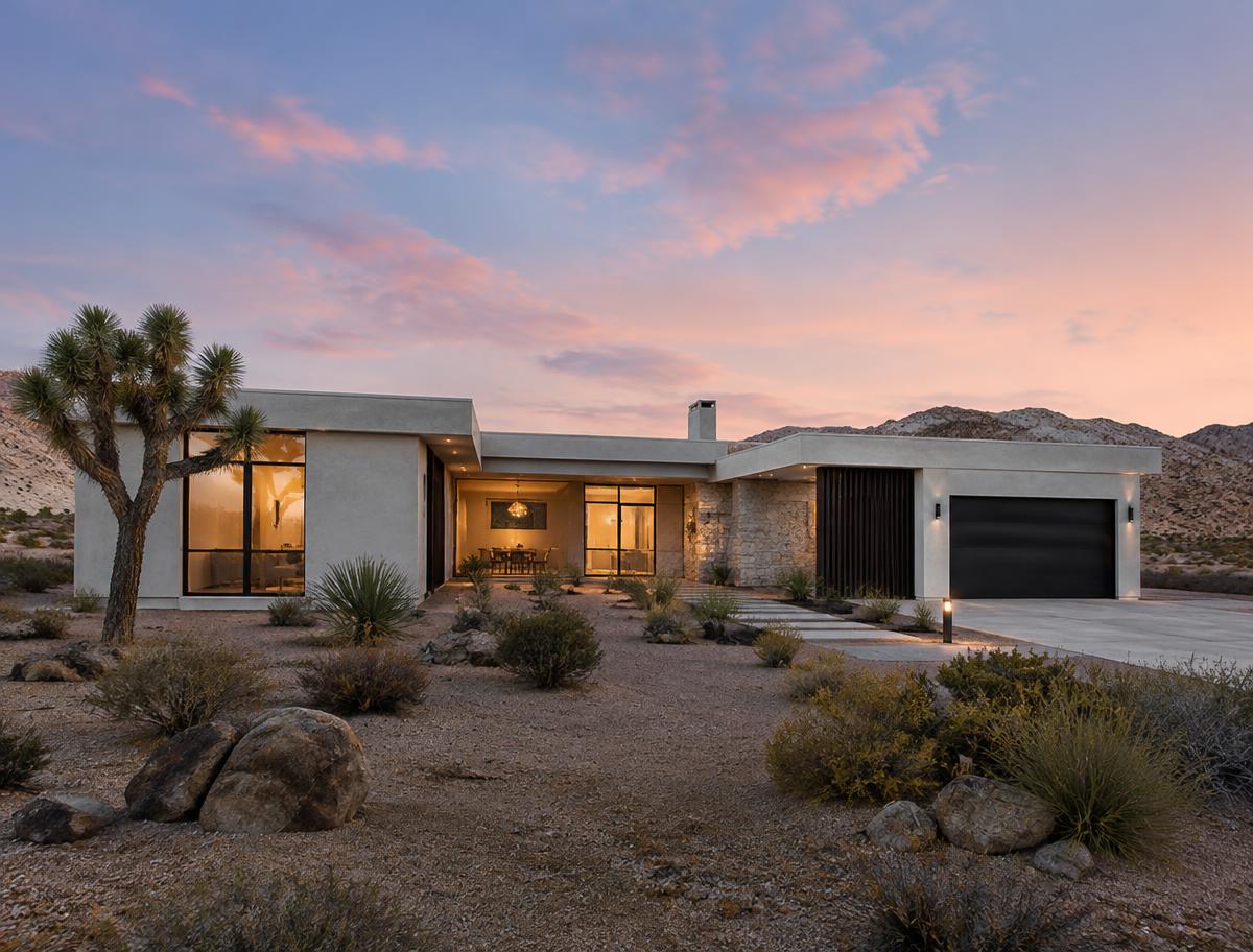 Newly built modern desert home at dusk